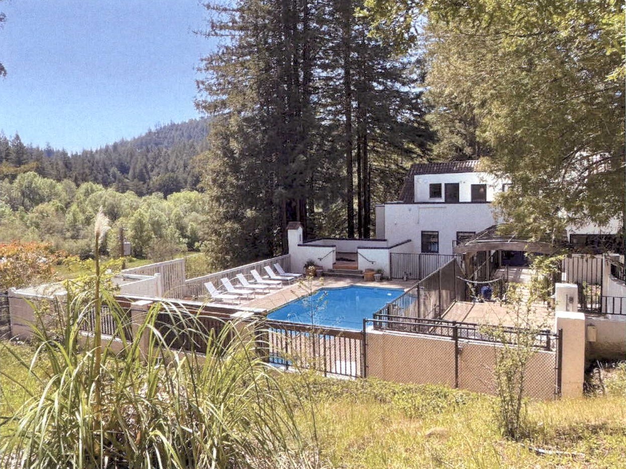 Overview of restored east facade and pool area